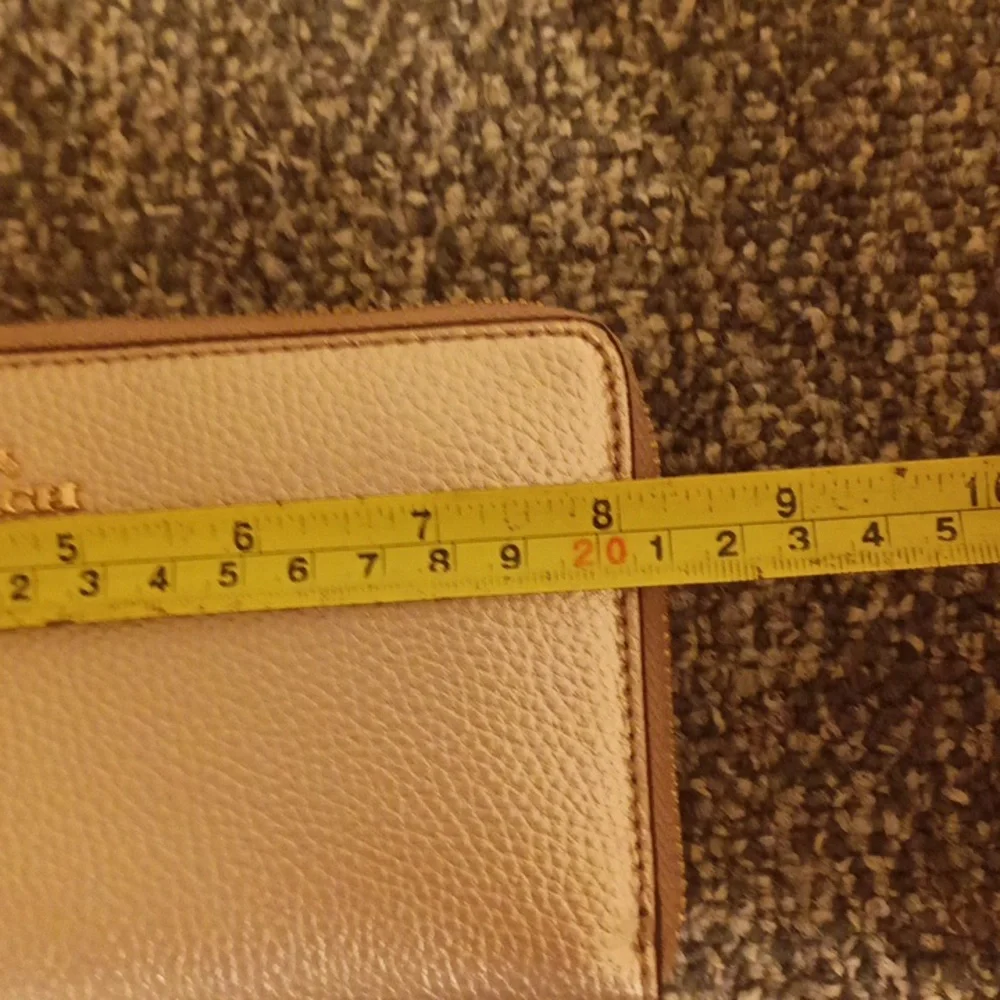 Coach gold pebbled leather accordion wallet